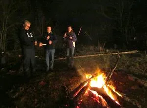 Men of the church chatting by the fire