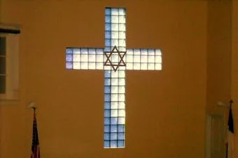 The glass-block cross window in the sanctuary