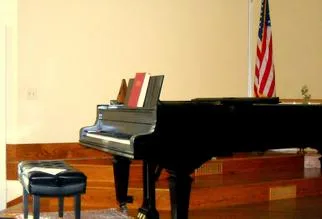 The grand piano at the front of the sanctuary