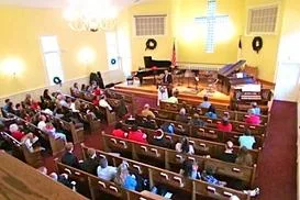 Members gathered in the sanctuary